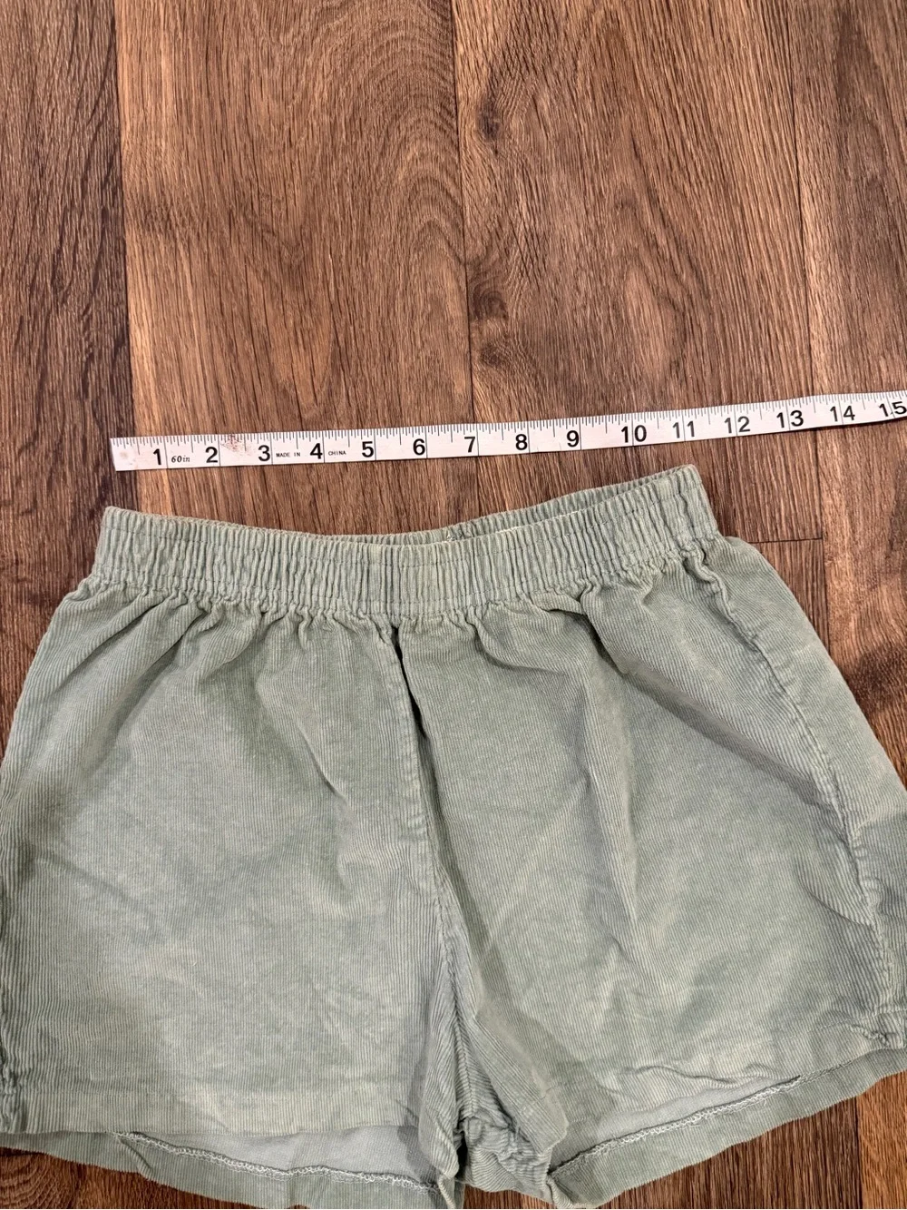 Green corduroy shorts